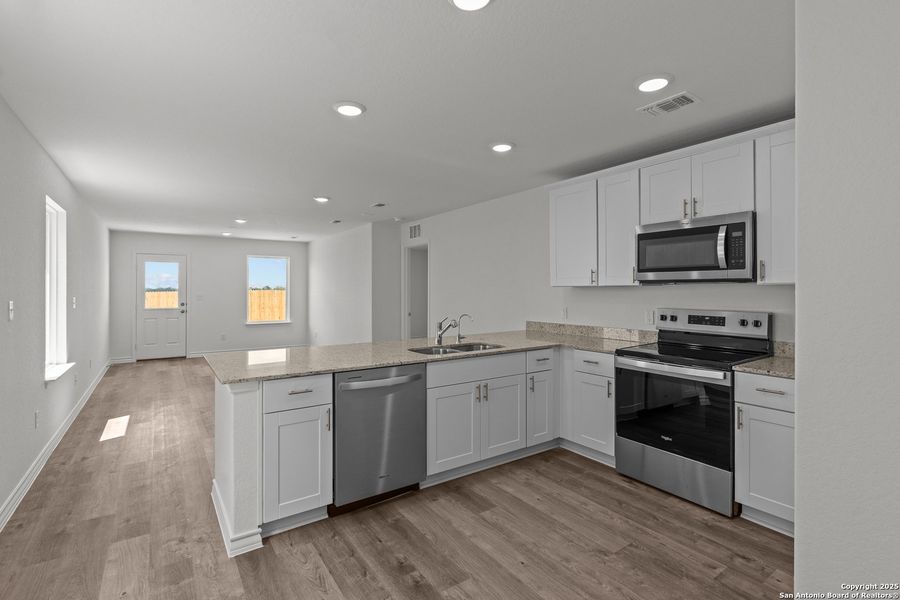 Furnished interior view inside a new home in Vista Real, Converse (Image 12).