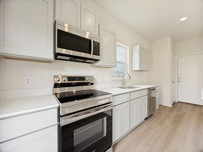 Furnished interior view inside a new home in Hanolley Hills, Sherman (Image 5).