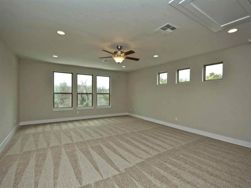 Representative unfurnished interior of a home built from the Madera II by Giddens Homes in Scofield Farms Estates, Georgetown (Image 426).