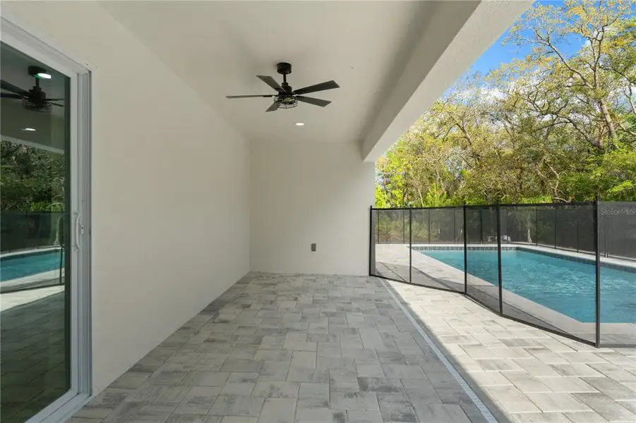 Exterior details and patio area of a home in , Weeki Wachee (Image 25).