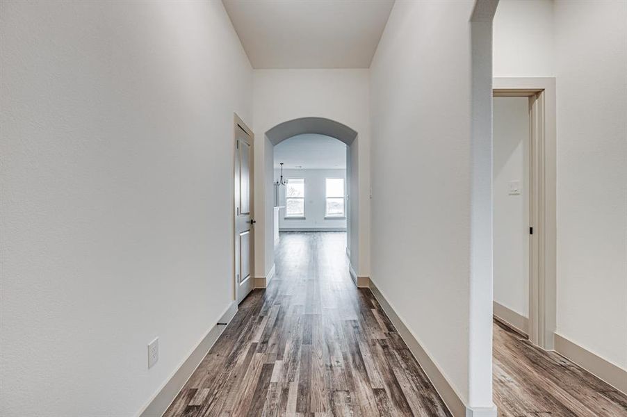 view from front door towards living area, bedrooms on right