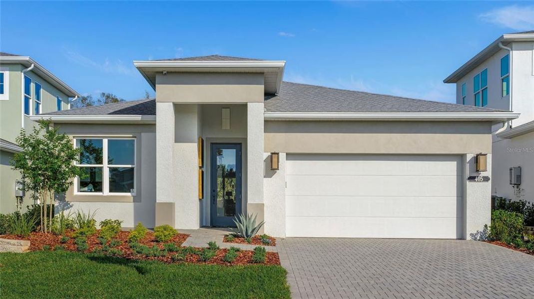 Front exterior of a new home in , Lady Lake, FL, highlighting curb appeal (Image 1). Front exterior of a new home in , Lady Lake, FL, highlighting curb appeal (Image 1).