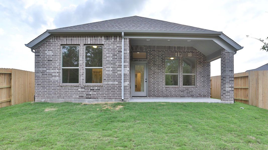 Exterior details and patio area of a home in Wildtree, Montgomery (Image 2). Exterior details and patio area of a home in Wildtree, Montgomery (Image 2).