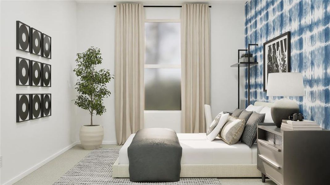 Bedroom with carpet and baseboards Bedroom with carpet and baseboards