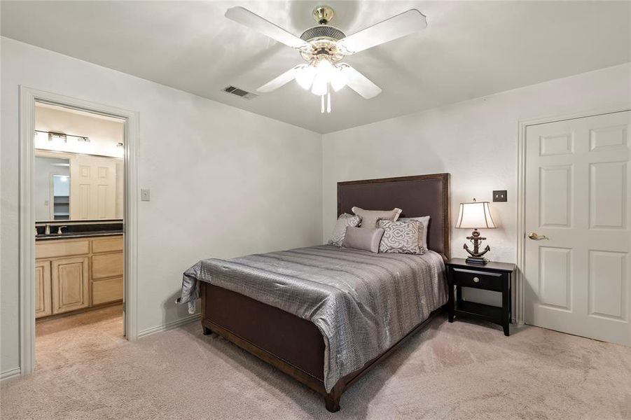 Cozy primary suite with easy access to ensuite bath.