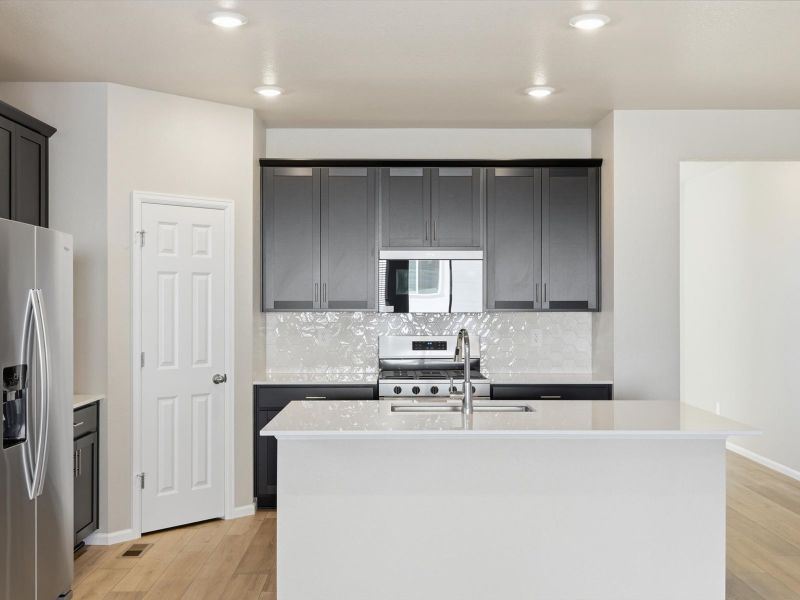 Furnished interior view inside a new home in Buffalo Highlands: The Canyon Collection, Commerce City (Image 8).