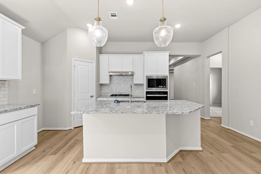 Furnished interior view inside a new home in Grand Central Park, Conroe (Image 10).