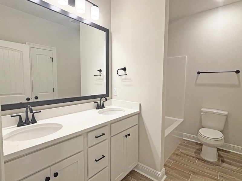 Furnished interior view inside a new home in Bird Song at Hammock Bay, Freeport (Image 12).