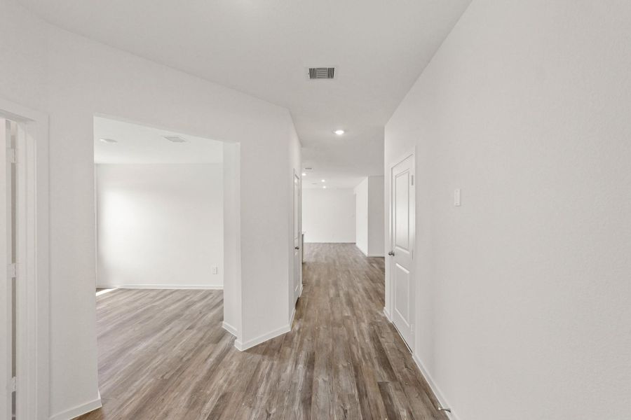 Spacious, unfurnished interior of a new home in Harrington Trails at The Canopies, Splendora (Image 10). Spacious, unfurnished interior of a new home in Harrington Trails at The Canopies, Splendora (Image 10).