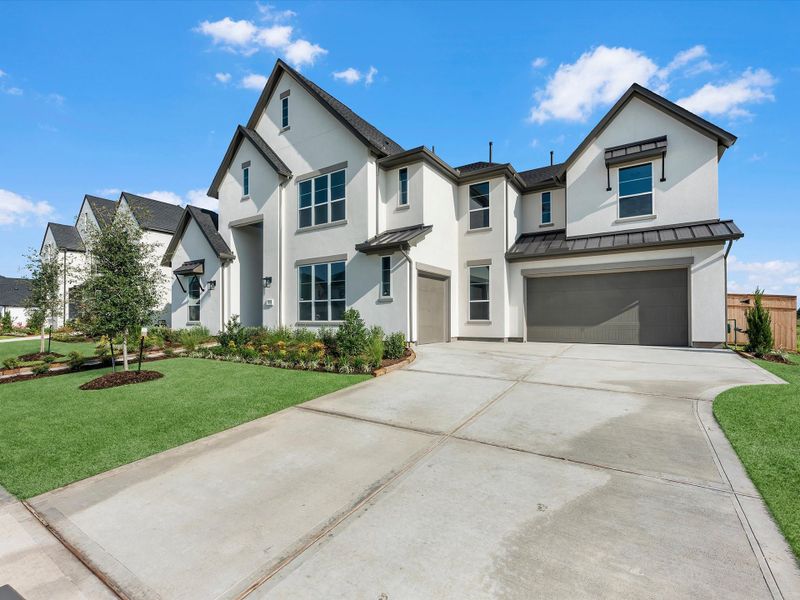 Front exterior of a new home in Sienna 80′, Missouri City, TX, highlighting curb appeal (Image 16). Front exterior of a new home in Sienna 80′, Missouri City, TX, highlighting curb appeal (Image 16).