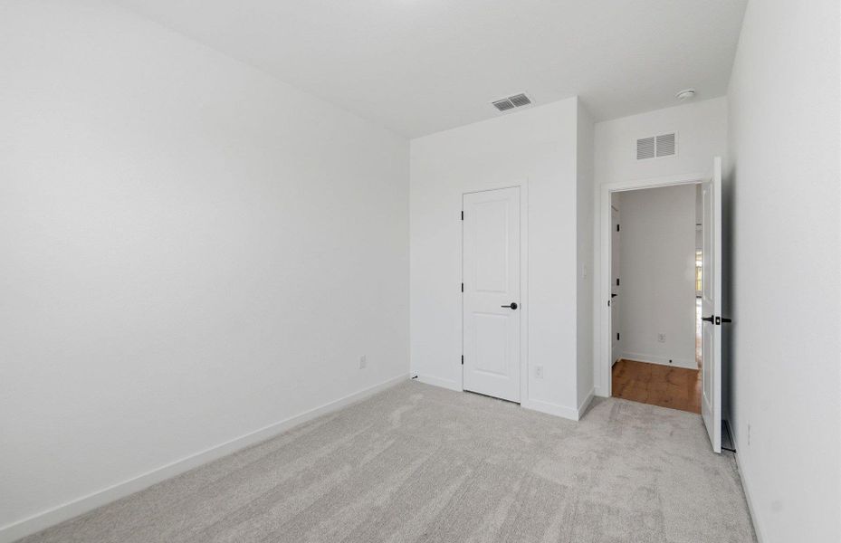 Spacious, unfurnished interior of a new home in Sunfield, Buda (Image 16). Spacious, unfurnished interior of a new home in Sunfield, Buda (Image 16).