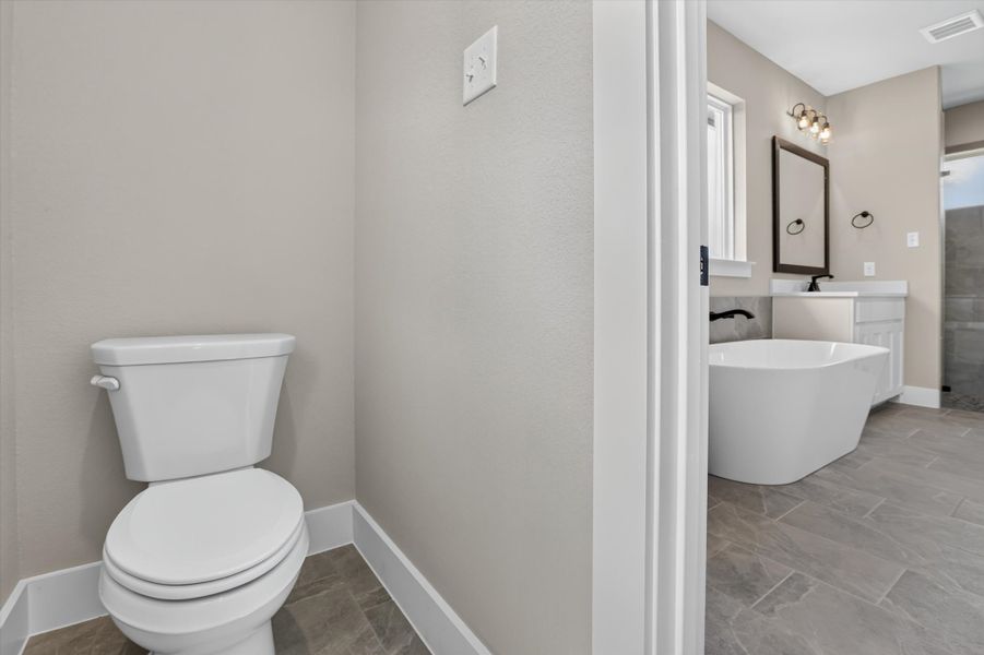 Furnished interior view inside a new home in Coyote Crossing, Godley (Image 14).