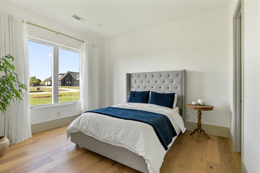 Bedroom featuring light hardwood / wood-style floors