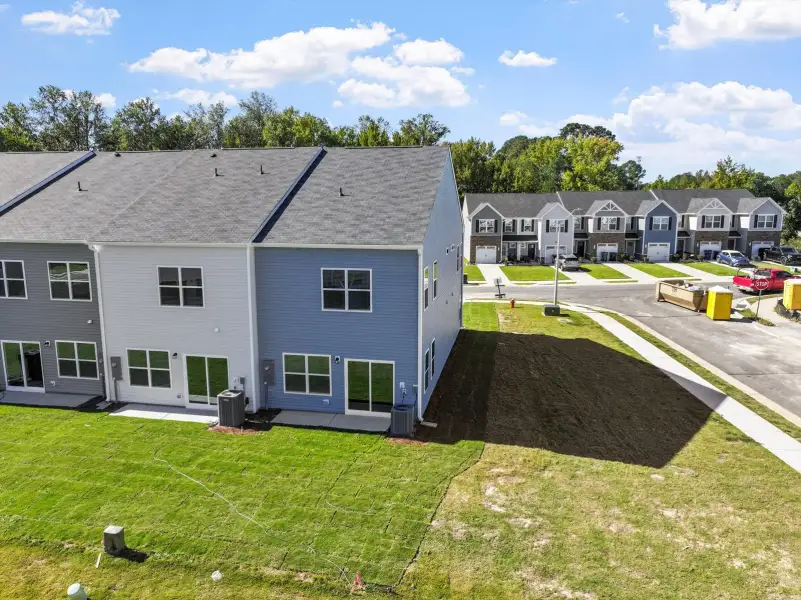 Exterior details and patio area of a home in West Main Townhomes, Sanford (Image 3). Exterior details and patio area of a home in West Main Townhomes, Sanford (Image 3).