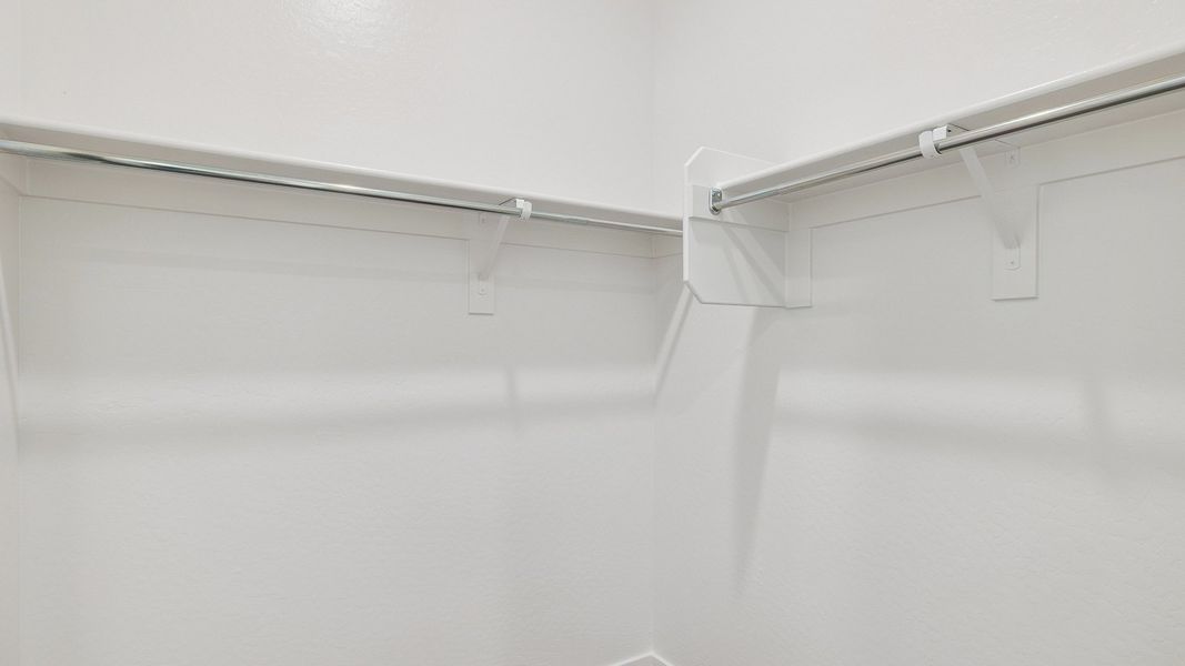 Representative unfurnished interior of a home built from the Crow by D.R. Horton in The Ridge at Stone Butte, Phoenix (Image 37).