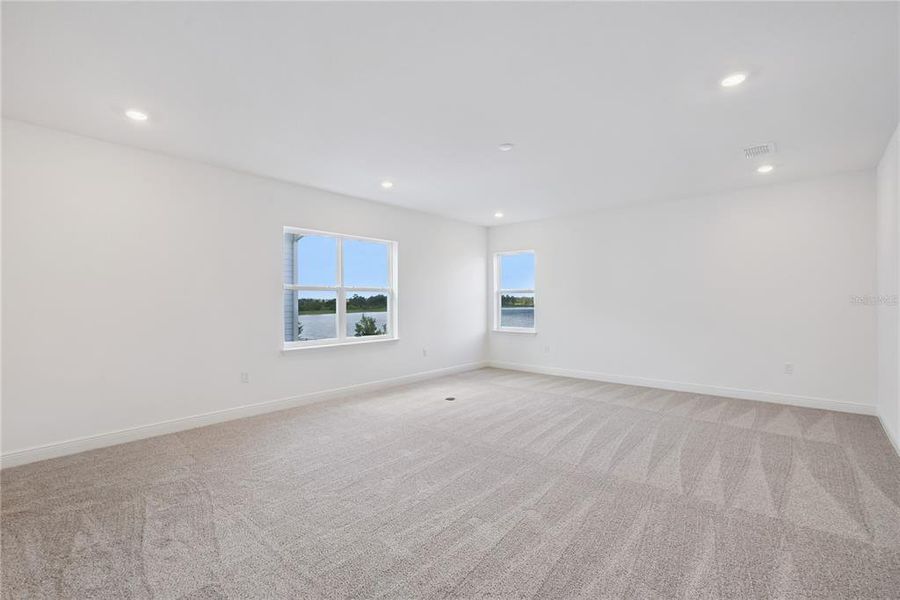 Spacious, unfurnished interior of a new home in Laureate Park, Orlando (Image 38).