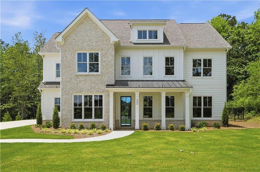 Front exterior of a new home in , Marietta, GA, highlighting curb appeal (Image 1). Front exterior of a new home in , Marietta, GA, highlighting curb appeal (Image 1).