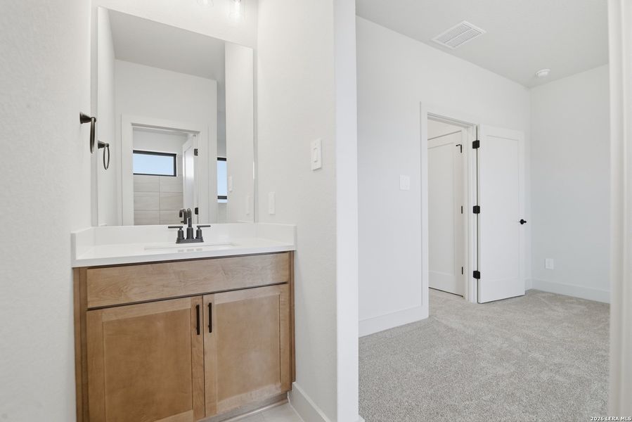 Furnished interior view inside a new home in Haby Hill 50s, San Antonio (Image 10).