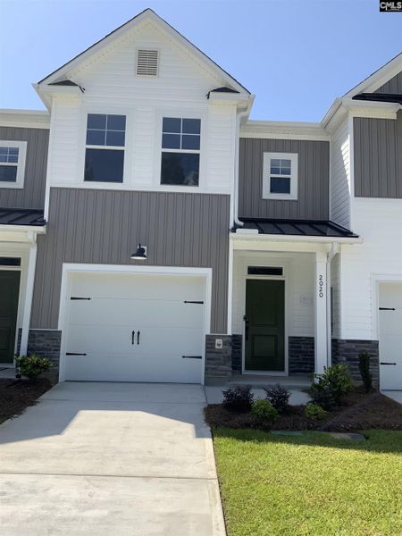 Front exterior of a new home in Victory Woods, Columbia, SC, highlighting curb appeal (Image 1). Front exterior of a new home in Victory Woods, Columbia, SC, highlighting curb appeal (Image 1).