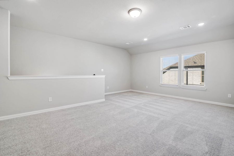 Representative unfurnished interior of a home built from the The Tulip by Lillian Custom Homes in The Preserve, Sherman (Image 20).