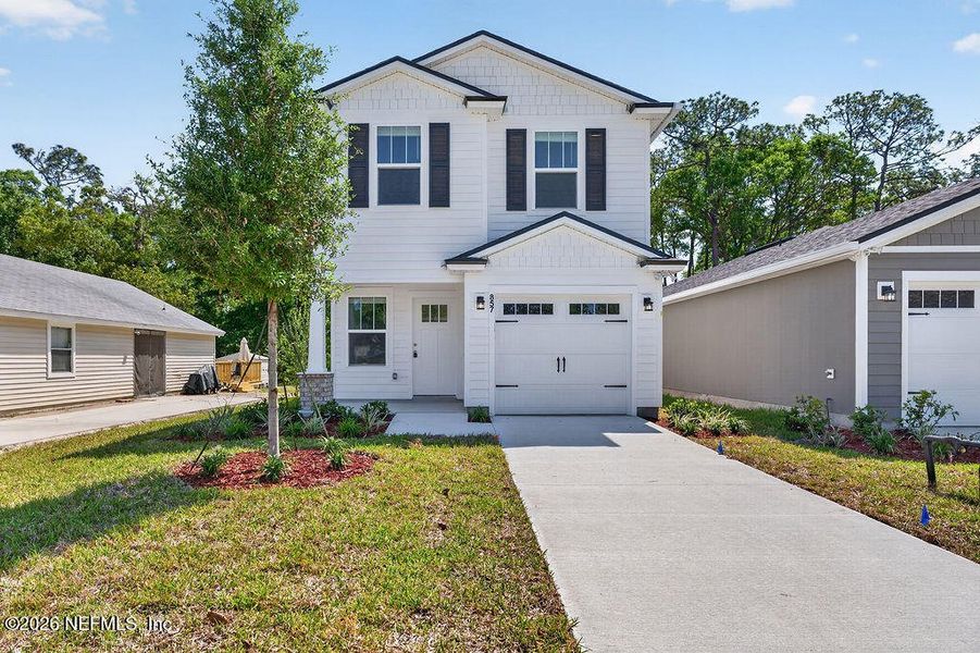Front exterior of a new home in , Jacksonville, FL, highlighting curb appeal (Image 24).