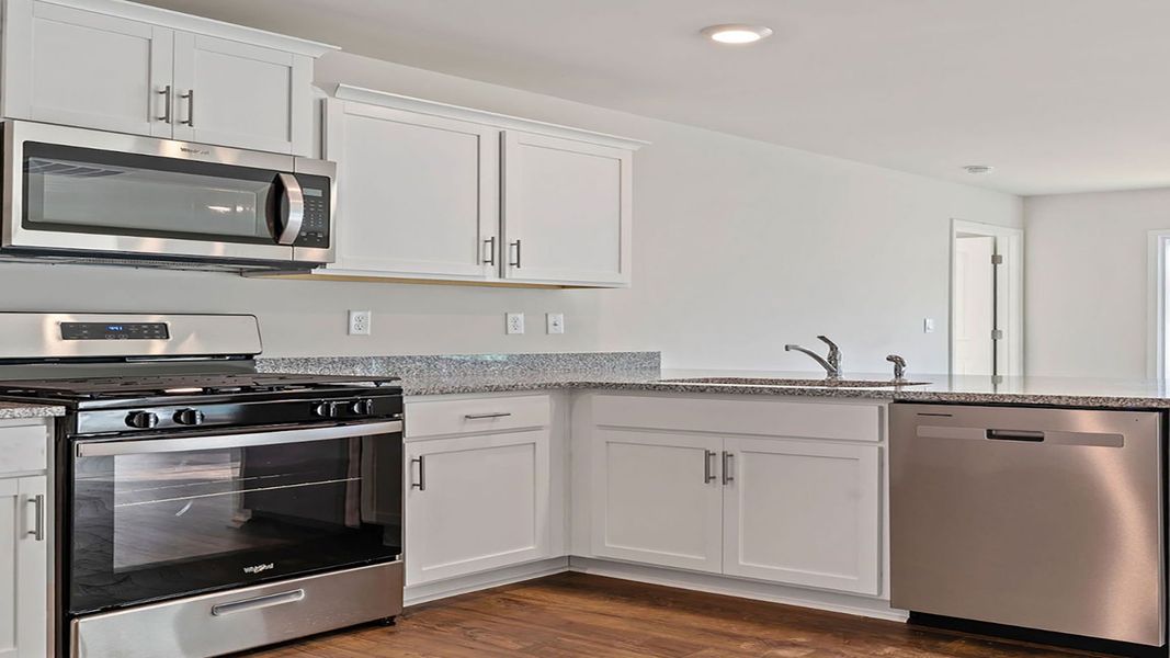 Furnished interior view inside a new home in Bentley Park, Greenwood (Image 11).