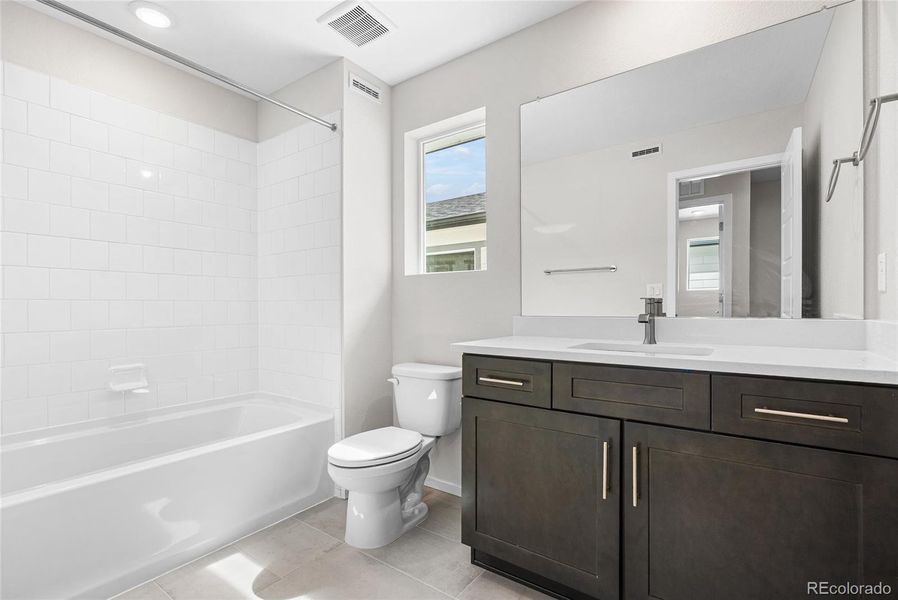 Furnished interior view inside a new home in Barefoot Village, Firestone (Image 12).