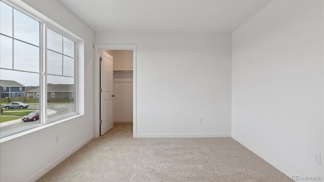 Spacious, unfurnished interior of a new home in Silver Peaks, Lochbuie (Image 15).