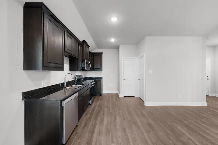 Furnished interior view inside a new home in Stonecreek, Sulphur Springs (Image 7).