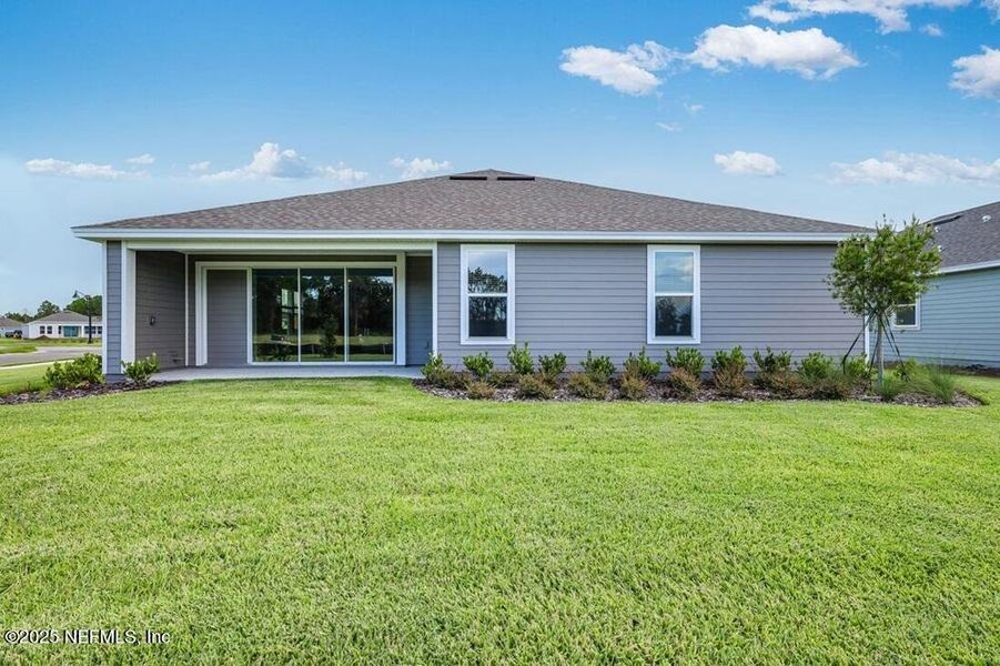 Exterior details and patio area of a home in Colbert Landings, Palm Coast (Image 23).