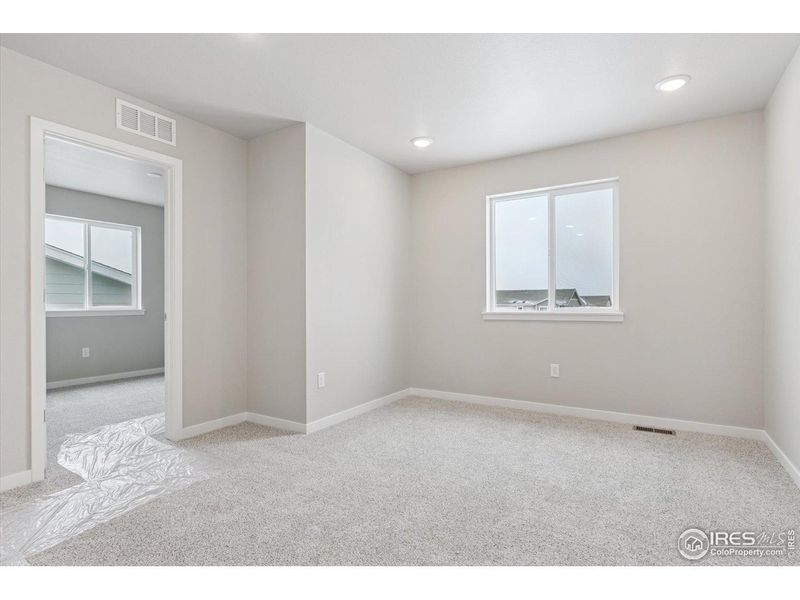 Spacious, unfurnished interior of a new home in The Overlook at Johnstown Farms, Johnstown (Image 23).