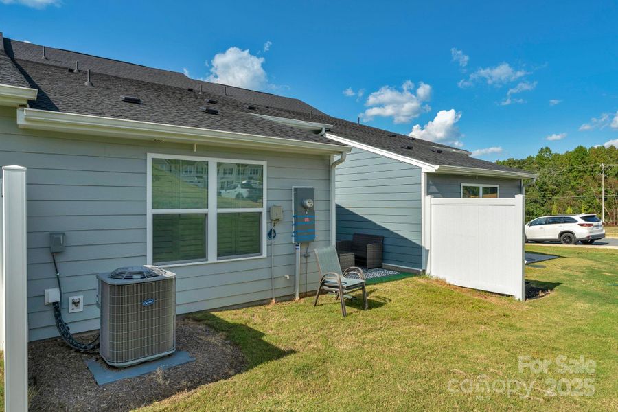 Front exterior of a new home in , Troutman, NC, highlighting curb appeal (Image 26).