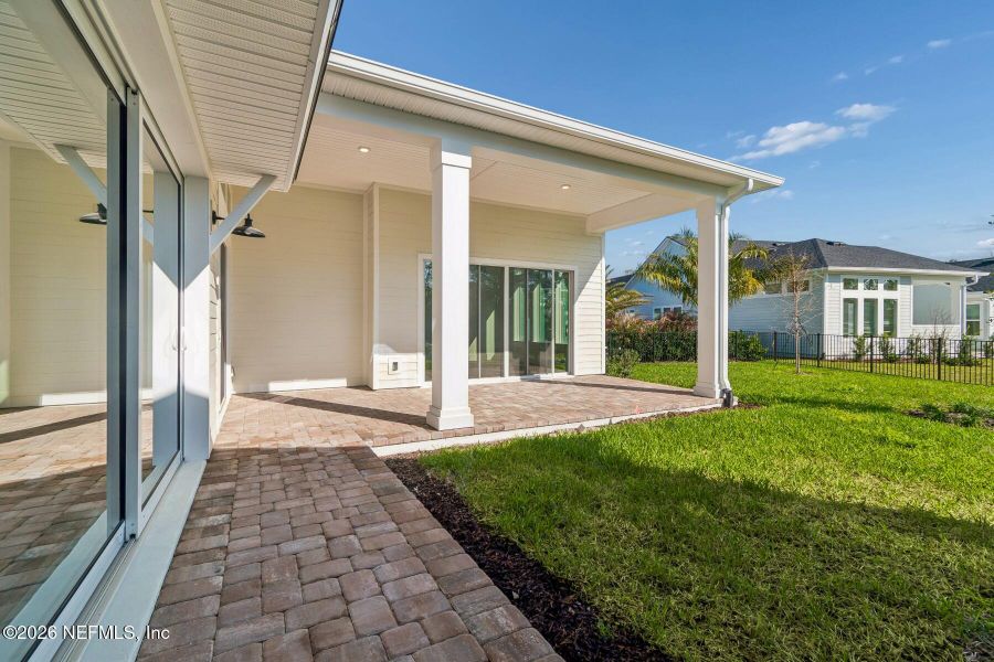 Exterior details and patio area of a home in Coral Ridge at Seabrook 80’, Ponte Vedra (Image 25).