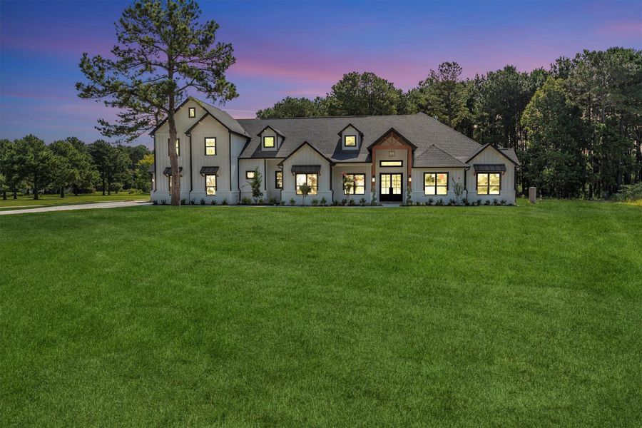 Front exterior of a new home in , Conroe, TX, highlighting curb appeal (Image 22).