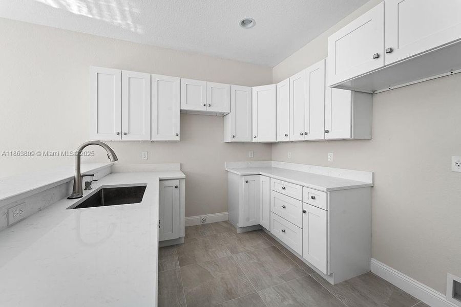 Furnished interior view inside a new home in , Tamarac (Image 8).