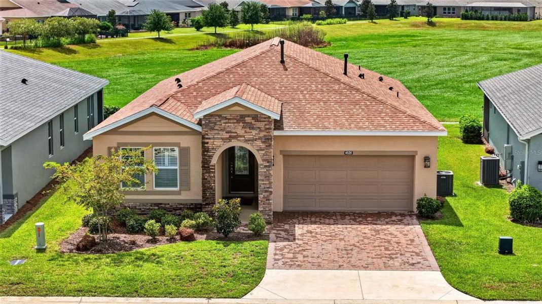 Front exterior of a new home in , Ocala, FL, highlighting curb appeal (Image 22).