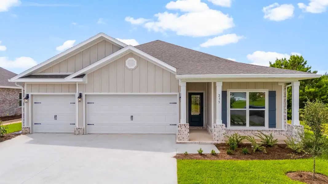 Front exterior of a new home in Owl's Head Farms, Freeport, FL, highlighting curb appeal (Image 1). Front exterior of a new home in Owl's Head Farms, Freeport, FL, highlighting curb appeal (Image 1).