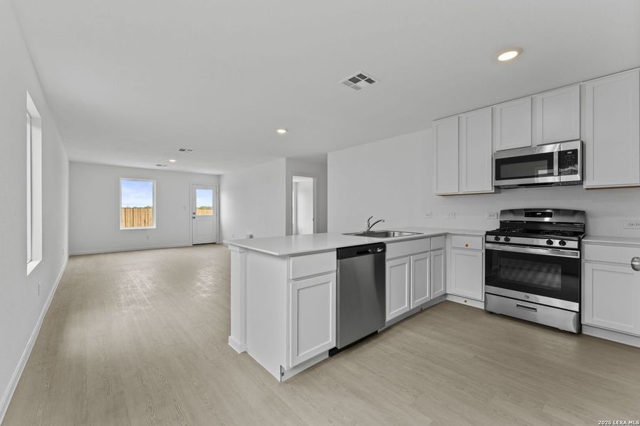 Furnished interior view inside a new home in Spring Grove, San Antonio (Image 4).