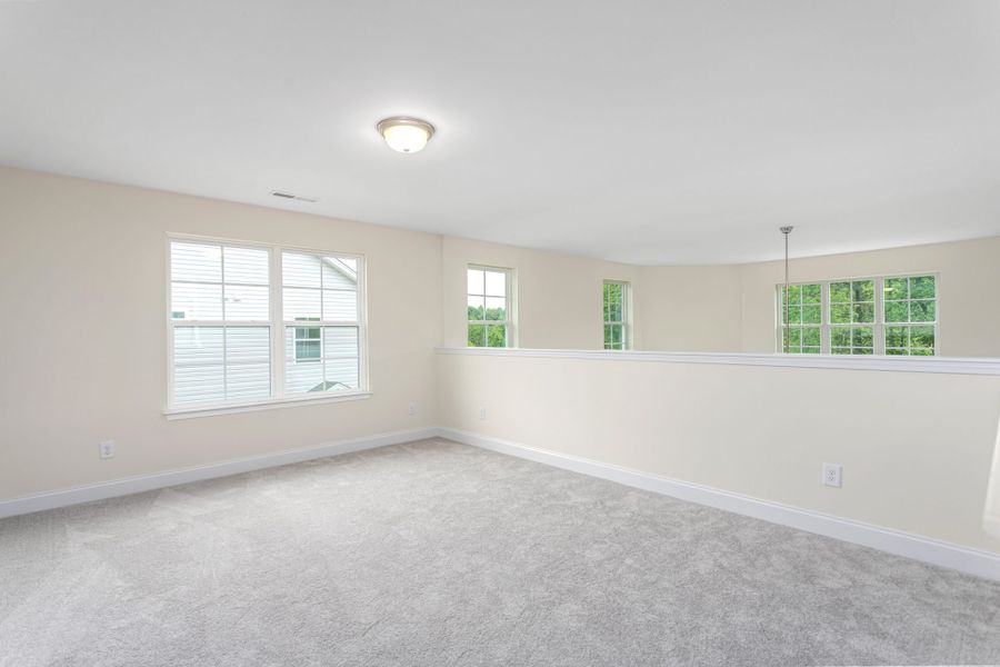 Representative unfurnished interior of a home built from the Jamestown by Keystone Homes NC in Sullivans Reserve, Walkertown (Image 19).