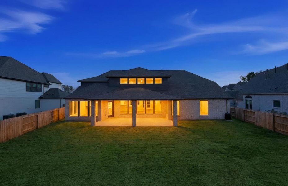 Exterior details and patio area of a home in Artavia 70′, Conroe (Image 25).