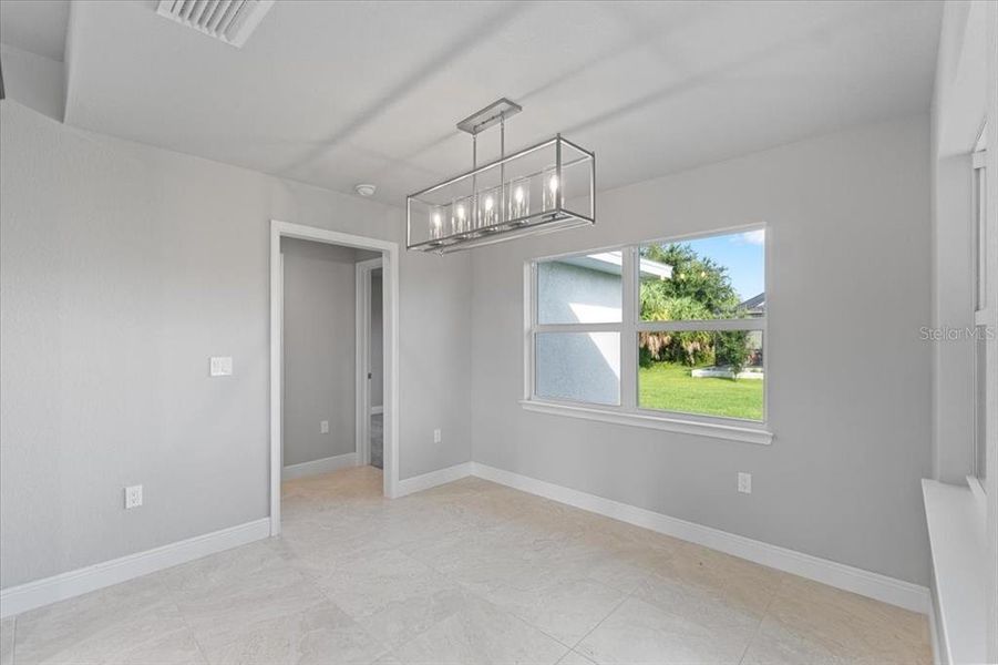 Spacious, unfurnished interior of a new home in , Port Charlotte (Image 20).