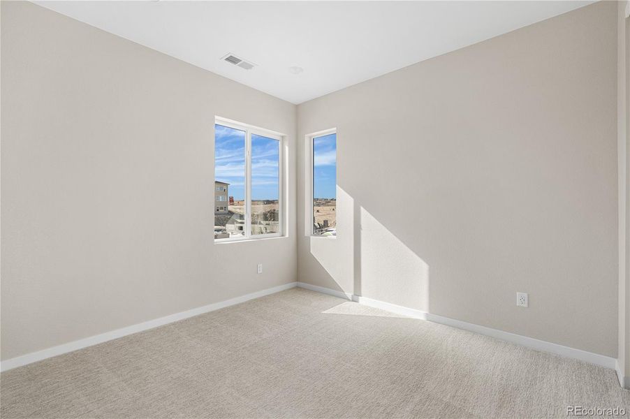 Spacious, unfurnished interior of a new home in Portrait at The Canyons, Castle Pines (Image 22).
