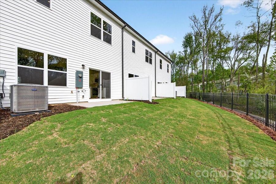 Extended outdoor living facing wooded area Extended outdoor living facing wooded area