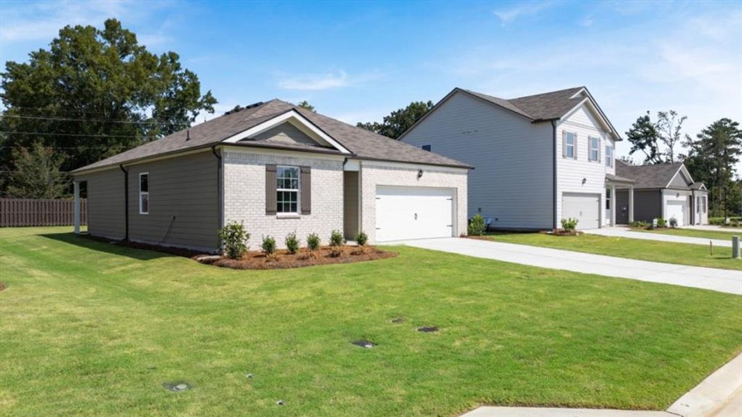 Front exterior of a new home in Northberry, Rome, GA, highlighting curb appeal (Image 19). Front exterior of a new home in Northberry, Rome, GA, highlighting curb appeal (Image 19).