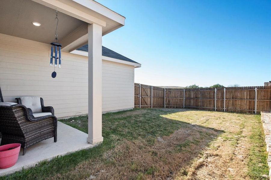 View of yard with a patio area