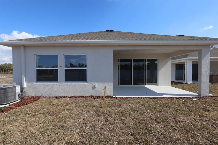 Exterior details and patio area of a home in Eastlyn, Bradenton (Image 3).