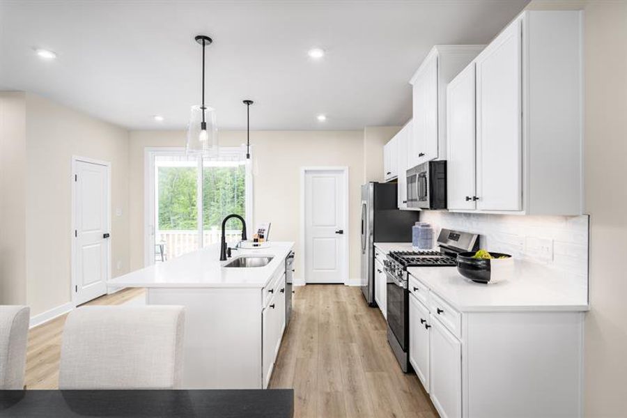 Representative furnished interior of a home built from the Schuman by Ryan Homes in Stowe Branch Townhomes, Charlotte (Image 6).