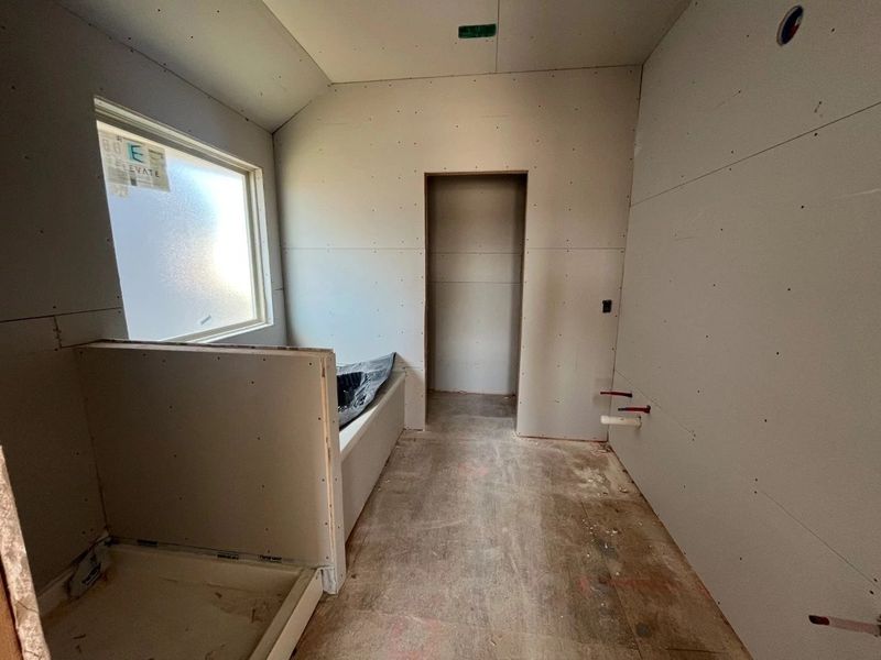 In-progress construction of a new home in Lariat, Liberty Hill, TX (Image 29).