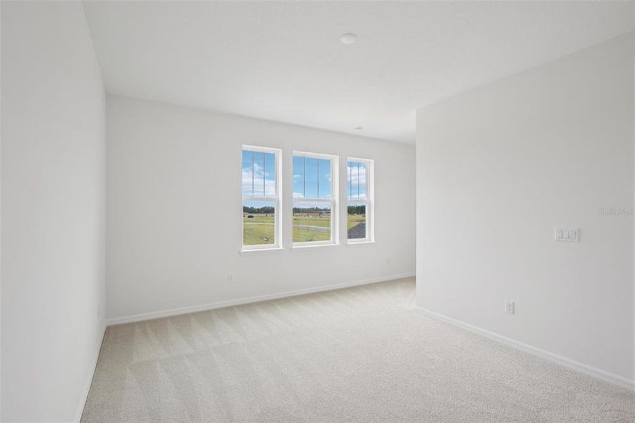 Spacious, unfurnished interior of a new home in Primrose at Longleaf, New Port Richey (Image 37).