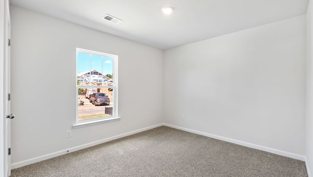 Spacious, unfurnished interior of a new home in Stone Creek, Clinton (Image 11).